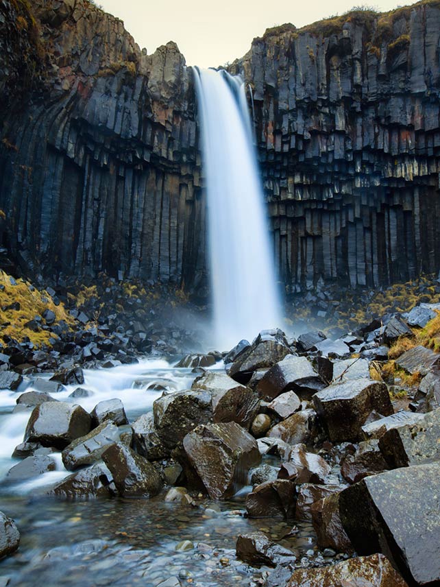 Svartifoss waterfall, Vatnajokull National Park in Iceland. Photo credit: Alex Robinson Photography.