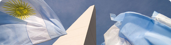 The Buenos Aires Obelisk with Argentinian flags.