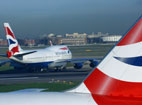 A British Airways plane takes off.