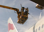 A Boeing 747 being cleaned and maintained.