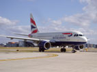 An Airbus A318 on the runway at London City airport.