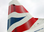 The tail fin of an Embraer 170 in BA livery.