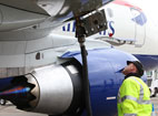 An Embraer 170 refuelling before departure.
