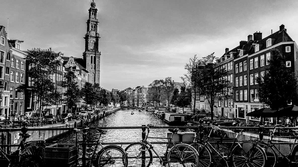 View of canal in Amsterdam in black and white.