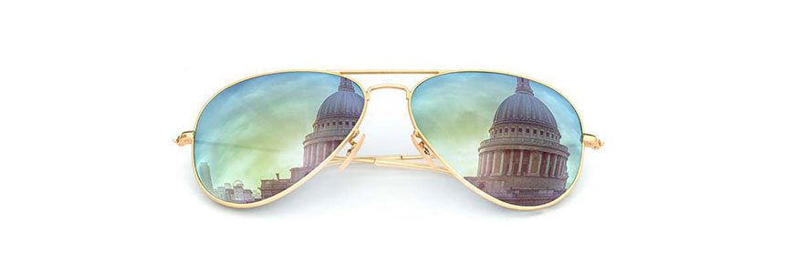 Sunglasses with St Paul's Cathedral showing in reflection.