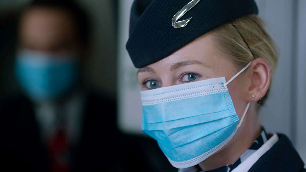 Close up of BA Cabin Crew wearing face mask.