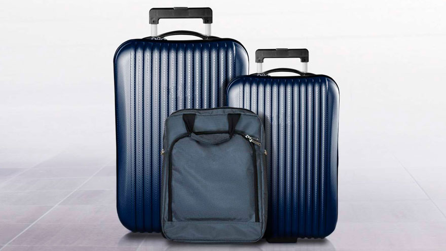 Zwei Koffer und einen Handkoffer.