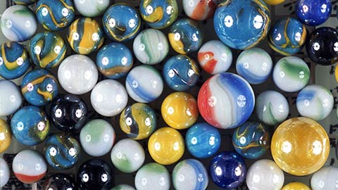 Avios logo and marbles.