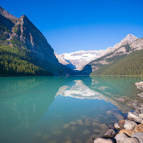 Canadian National Park. As seen from the Eastern shore, the beautiful Lake Louise, situated in Alberta&rsquo;s Banff National Park, 180 kilometres west of Calgary.