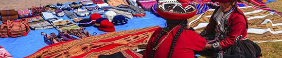 Women weaving traditional cloth in Peru.