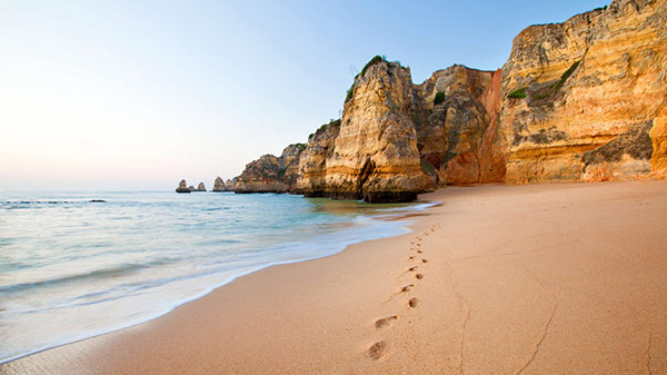 Footsteps in sand beach.