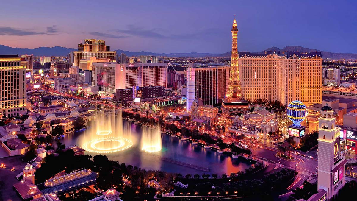 City skyline at night with Bellagio Hotel water fountains, Las Vegas, Nevada, America, USA.