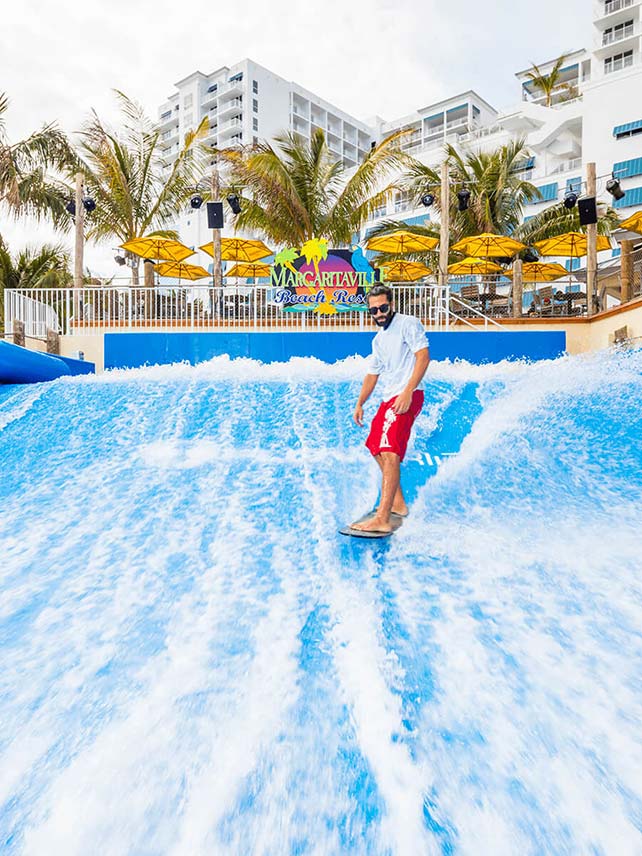 Trying out the FlowRider® Double at Margaritaville Hollywood Beach Resort. ©Margaritaville Hollywood Beach Resort.