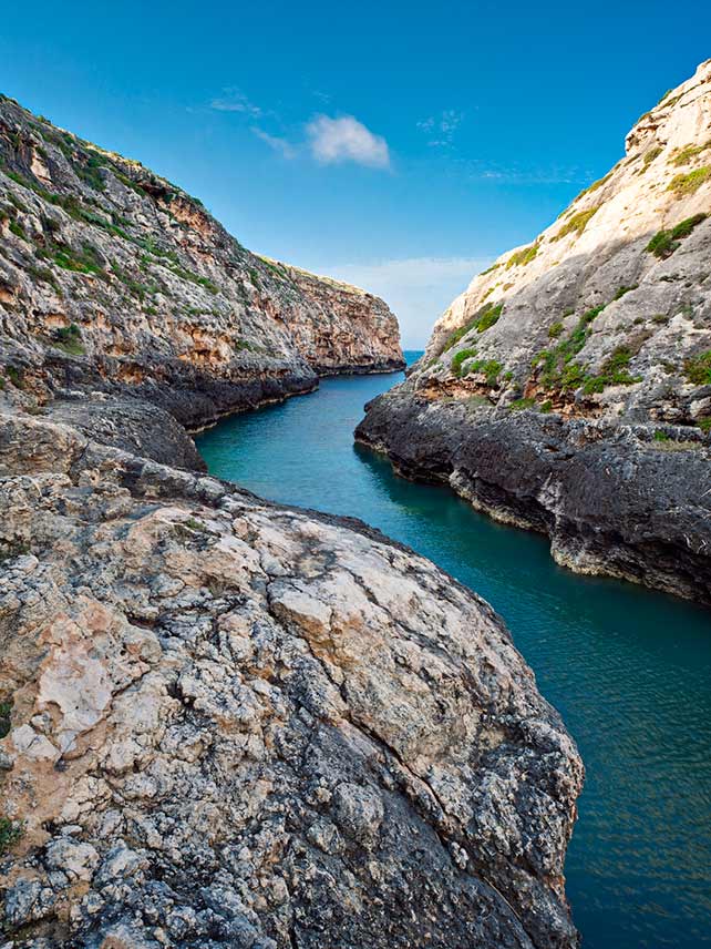 The stunning inlet of Wied il-Ghasri in Malta appeals to both sunbathers and snorkellers © Allard Schager/Getty Images