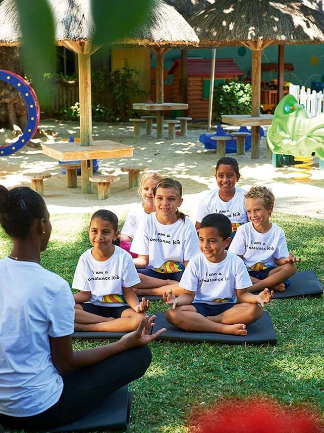 Yoga at the Constance Kids Club, Constance Belle Mare Plage Resort. © CONSTANCE HOSPITALITY MANAGEMENT.