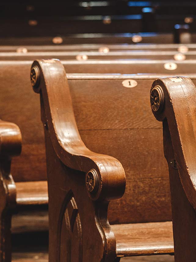 The Ryman’s wrap-around church pews are over a century old.