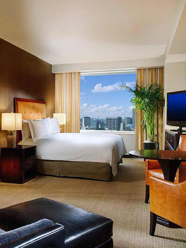 Kick back and relax in a Chairman Guest Room at Hilton Americas Houston