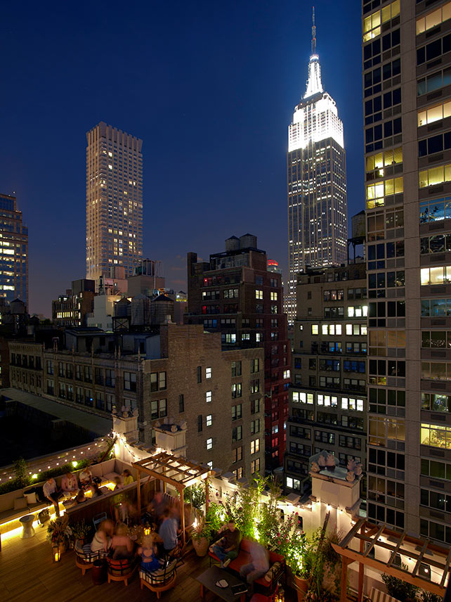 Sip cocktails and enjoy cinematic views of the Empire State Building at the Refinery Hotel
