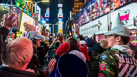 NEW YORK CITY - DECEMBER 23, 2016: Traffic and crowd fill Times Square as the city prepares for New Year's Eve.