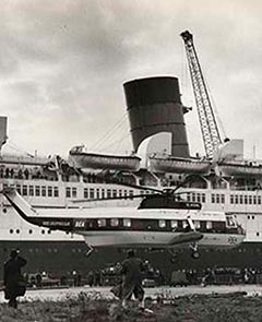 BEA Helicopters Sikorsky S61N G-ASNL alongside RMS Queen Mary.