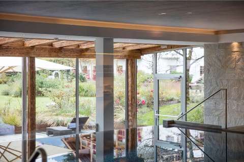 Accommodation - Hotel Kitzhof Mountain Design Resort - Pool view - Kitzbuehel
