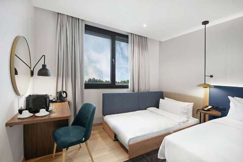 Unterkunft - Hilton Garden Inn Bucharest Airport - Gästezimmer - Bucharest